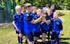 MK United U12 Jaguars League Champions - Team lifting the trophy and celebrates with the trophy